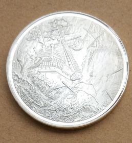Коллекционная монета Пираты Карибского Моря