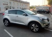 Kia Sportage 2014г. серого цвета вид справа