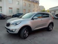 Kia Sportage 2014г. серого цвета вид слева спереди