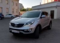 вид спереди слева Kia Sportage 2014г. серого цвета