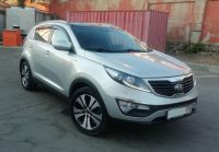 Kia Sportage 2014г. серого цвета вид спереди справа