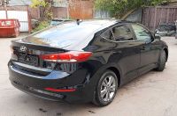 Hyundai Elantra 2018г. черного цвета вид сзади слева
