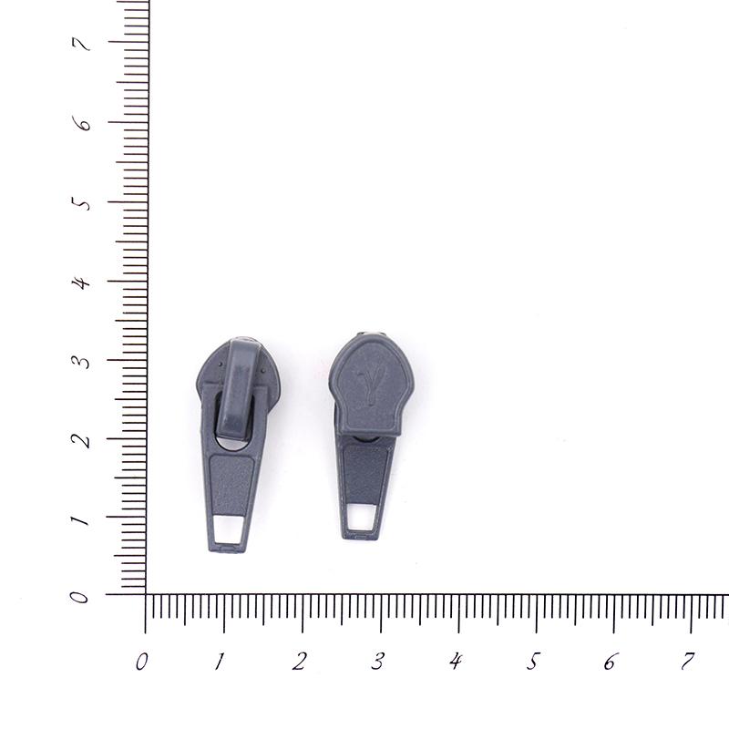 Замок к молнии спираль т.7 автомат т. серый.    Цена 20 руб/шт