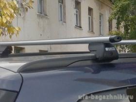 Багажник на интегрированные рейлинги Opel Astra H, универсал, Евродеталь, аэродинамические дуги