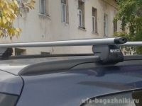 Багажник на интегрированные рейлинги Opel Astra H, универсал, Евродеталь, аэродинамические дуги