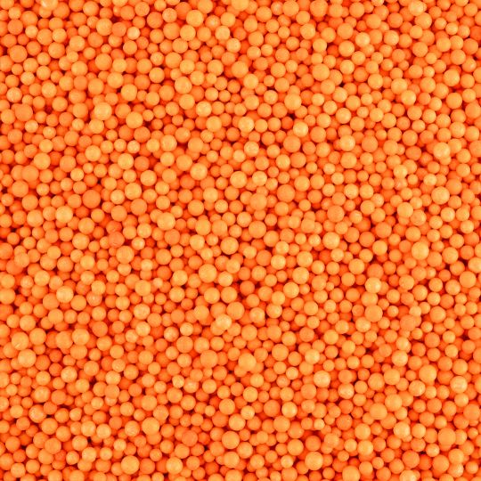 Оранжевые мелкие пенопластовые шарики